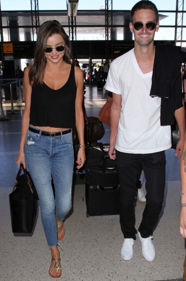 Model Miranda Kerr and her Billionaire boyfriend Evan Speigel are spotted as they arrive at LAX Airport in Los Angeles, Ca for an Air France Flight to Paris Pictured: Model Miranda Kerr and Evan Speigel Ref: SPL1101600 130815 Picture by: SkyFall /London Entertainment Splash News and Pictures Los Angeles:310-821-2666 New York: 212-619-2666 London: 870-934-2666 photodesk@splashnews.com 